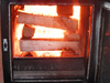 The dry wood in the optimally calculated firebox burns very hot with a bright – almost white – flame.  The key to clean combustion in a masonry heater is a well-designed, properly sized firebox along with good, dry fuel.