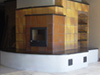 A full perspective view captures all the varying elements of this completely custom design.  The heater exists as four levels – bench, firebox, front element, and side element in an asymmetric arrangement.  All are capped with granite and each element contains flues for heat accumulation and gentle radiant heat.