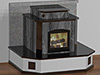 As is my practice in custom work, I created a CAD drawing of a proposed design to meet all the criteria and still to function as an efficient masonry heater.  This original design proposed a primarily soapstone heater with black granite benches and stucco bench supports.  Granite 'baseboard', corner inlays, and accent elements accompany the soapstone.  The inset 'cupola' on top adds just a little visual interest to break up the potential boxiness of the design.
